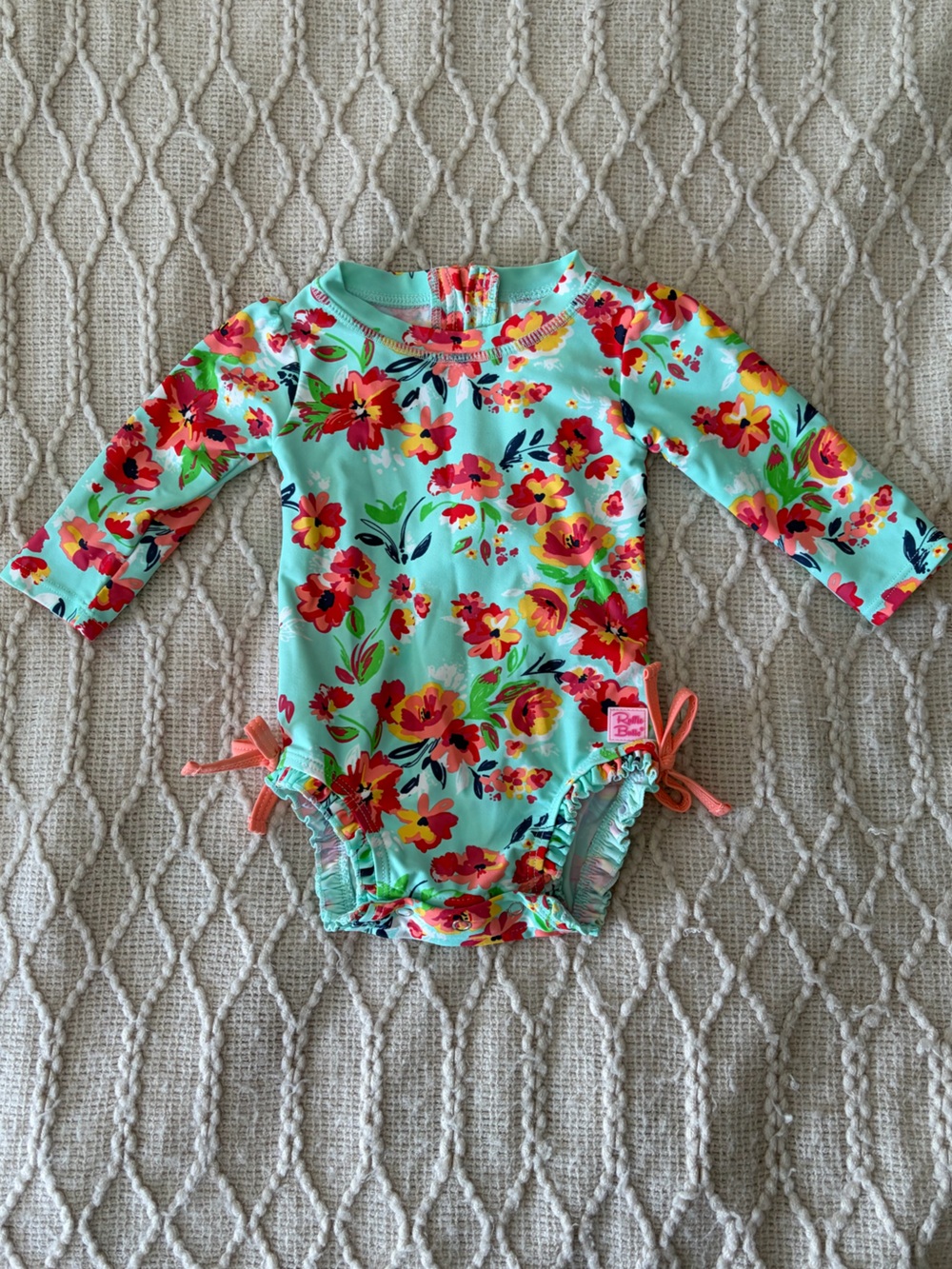 Ruffle Butts Floral Long-Sleeve One-Piece Swimsuit with Coral Accents